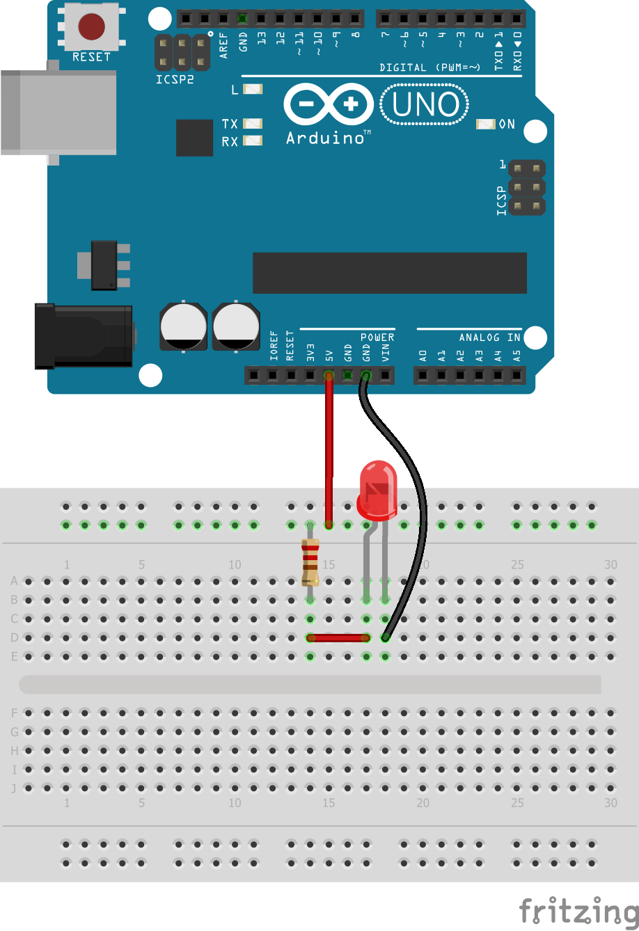 Montaje en protoboard de placa Arduino con un led conectado a la alimentación
